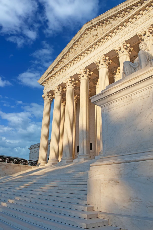 Supreme Court building under blue sky